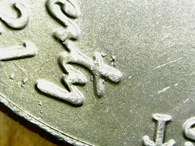Is-This-A-Die-Mark-Next-To-The-T-In-Liberty-On-This-2021-P-Nickel?
